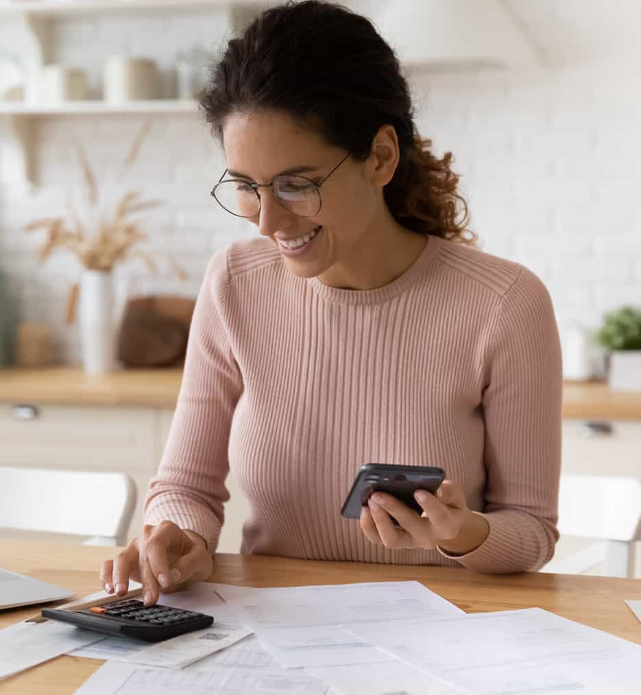 Young woman on computer looking at finances